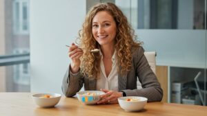 Professional woman choosing the just right PeopleSoft UX solution among three options, representing migration alternatives